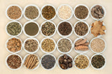 Herb and root collection in bowls. Helps heal the nervous system calms anxiety and stress. Healthy natural adaptogen alternative health care. On hemp paper.