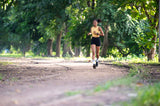young woman running in the park