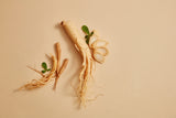 Korean ginseng root and some ginseng slices decorated on beige background.