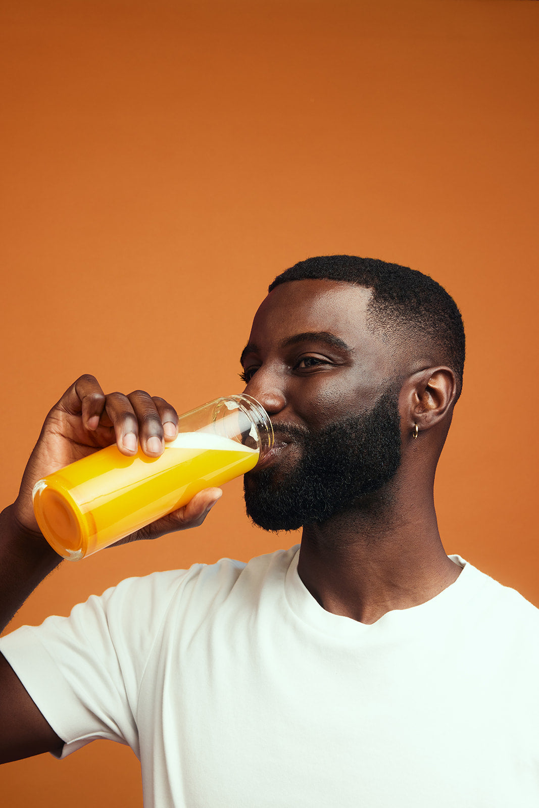 Male customer drinking Modern Dose Joint Support in citrus - moderndose.com