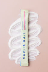 Modern Dose Essential Health in  guava stick pack laying over its powder - www.moderndose.com
