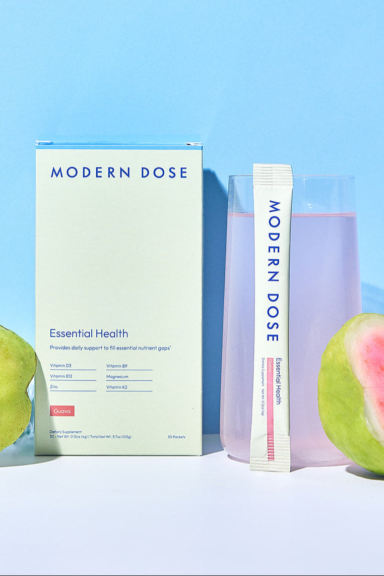 Modern Dose Essential Health box, stick pack, and drink with halved guavas - www.moderndose.com